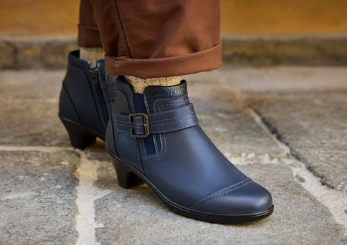 ladies navy blue dress boots Women's Outfit: Floral Swing Dress, Teal Suede Ankle Boots, Purple Leather Crossbody Bag slip recycled rubber outsole 2.5 cm / 1.0 heel height 13 cm / 5.1 shaft height Consciously handcrafted in Europe All taxes included in the price Materials OrthoFeet Emma Supportive Comfort Women's